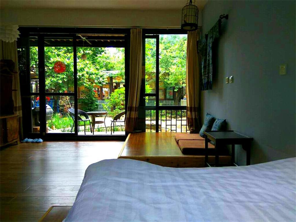 Lijiang Baisha Free Time Designed Hotel Экстерьер фото
