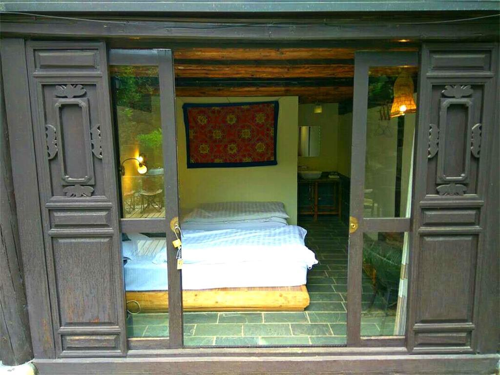 Lijiang Baisha Free Time Designed Hotel Экстерьер фото